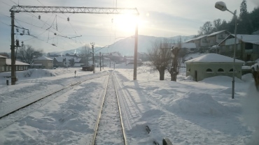 Winter sun on the snowy tracks